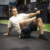 Roller fitness do masażu ciała, średnio twardy, wałek z wypustkami, czarny